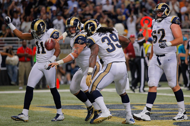 SJ39 rolls the dice after his fourth quarter touchdown dive (Getty Images).