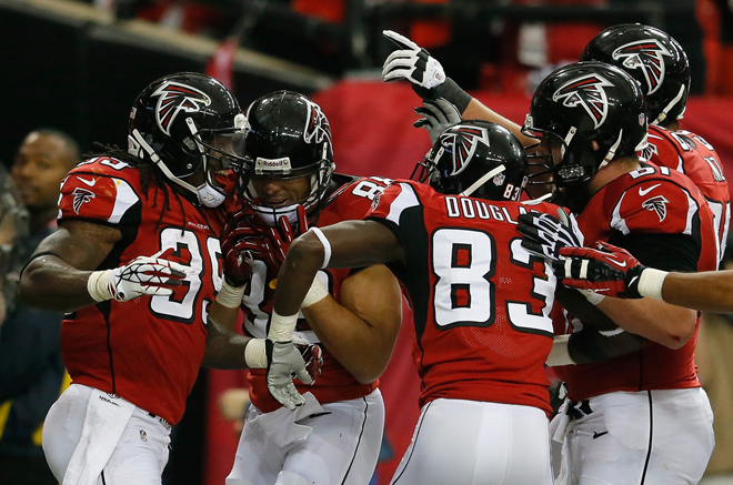 Steven and his teammates celebrate his first of two touchdowns in a 27-26 win over Washington (Getty Images).