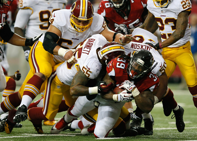 It took five Redskins tacklers to keep Steven from the end zone in the second quarter (Getty Images).